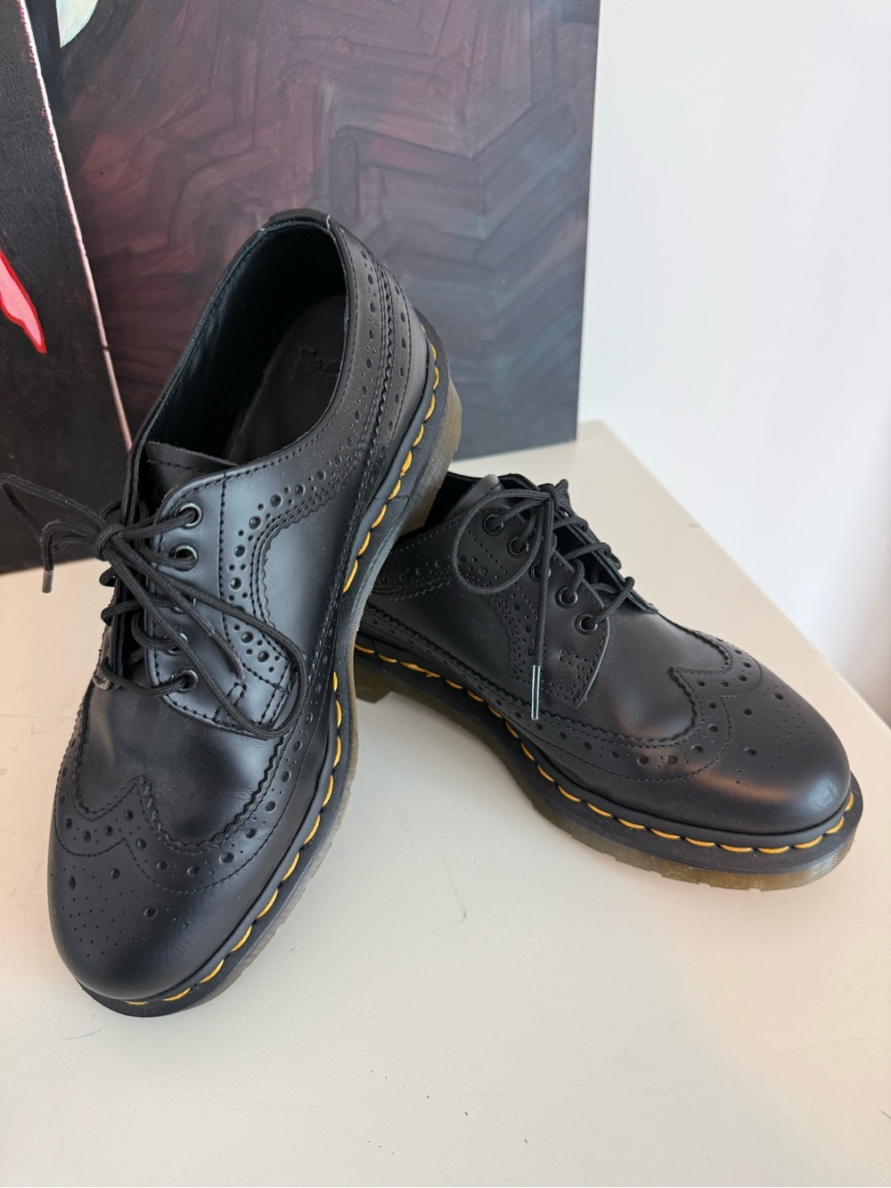 Dr. Martens Black Leather Wingtip Oxfords with Yellow Stitching